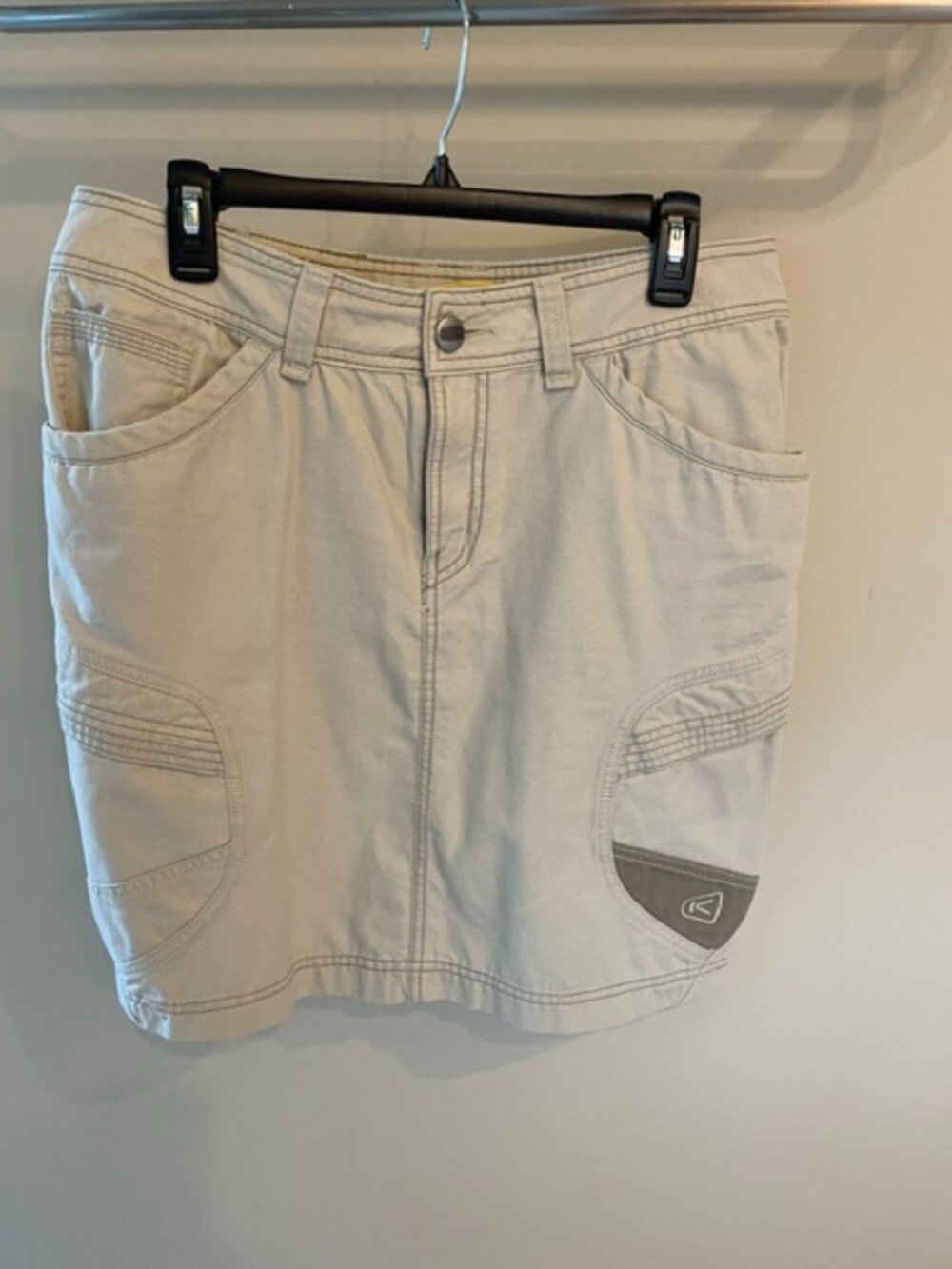 Women's Denim skirt in khaki or light tan, 20 inch length.